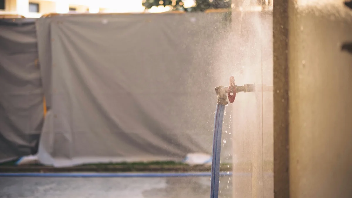 Water spraying from outdoor faucet valve during cleaning operation