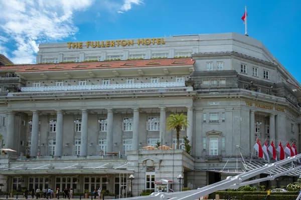 Grand historic hotel building with classical columns and ornate facade