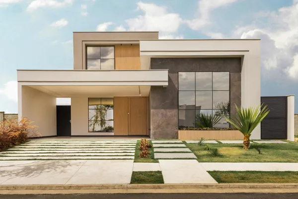 Modern residential home exterior with large windows and clean glass panels